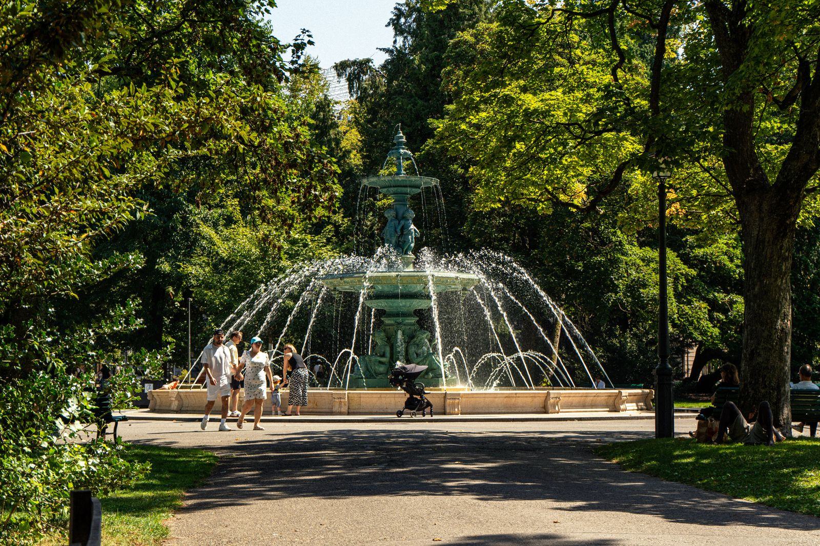 A park fountain in summer: Victoria Park is the city's centre and the festivals' home