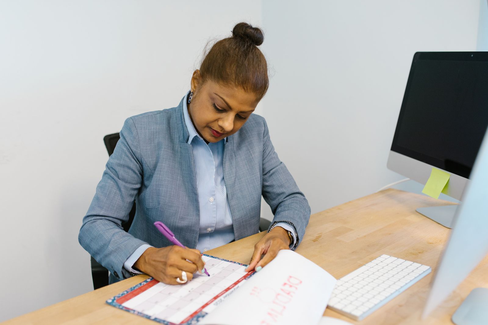The assistant's desk: a corporate booking takes two minutes with the profile on file