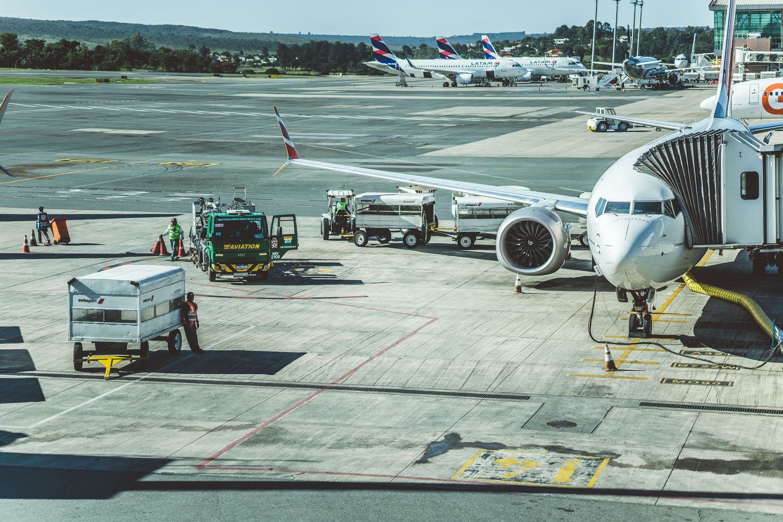 Ramp-side where the FBO permits it; lounge-side where it does not - the chauffeur knows which